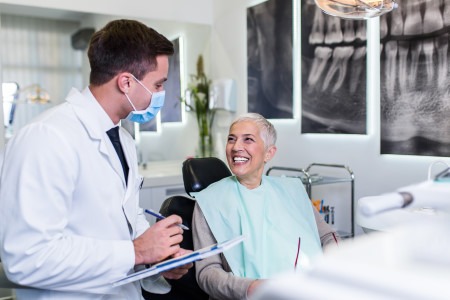 lady sitting in a denturists office
